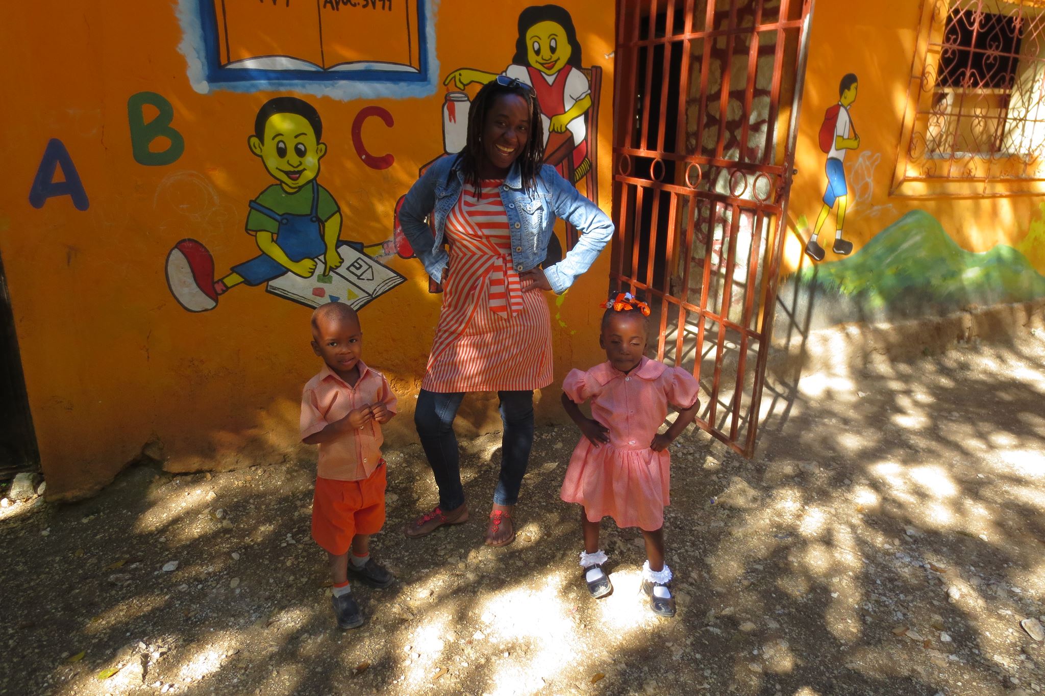 Marleen Julien with children at a partner school in Haiti